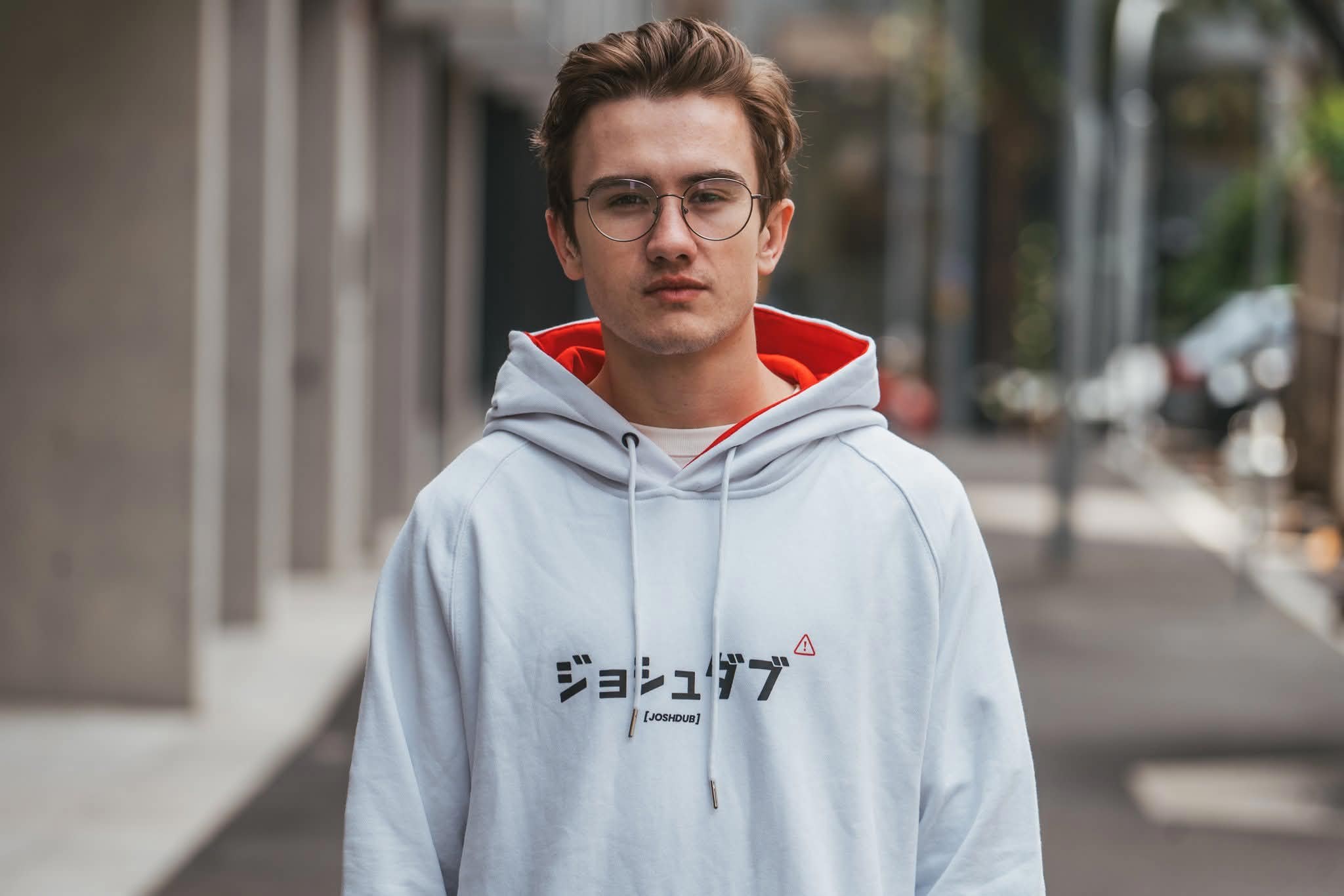 Creator JoshDub in his HYPR produced hoodie with katakana branding