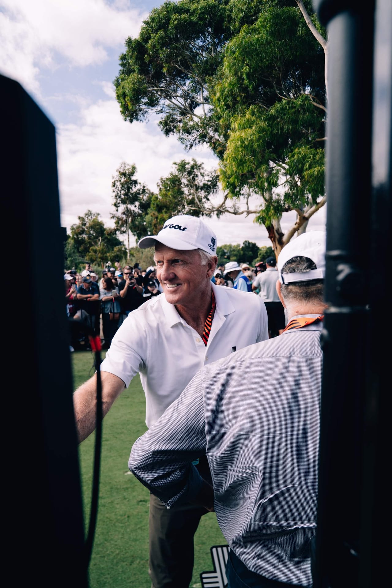 LIV Golf CEO Greg Norman greeting guests on course at LIV Golf Adelaide