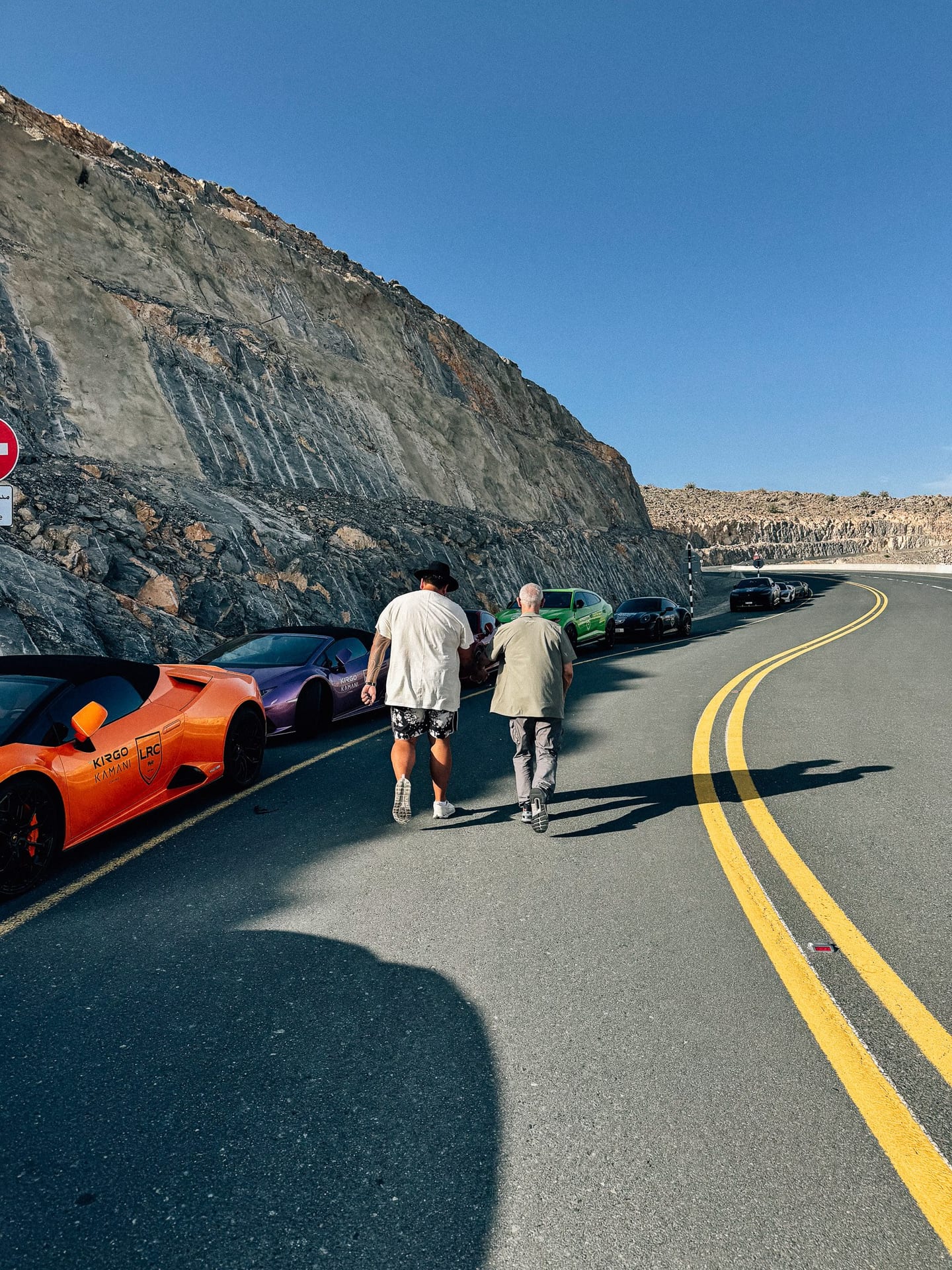 Hypercar convoy pulled over on a mountain pass during the 200km UAE Desert Rally route